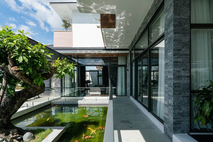 Biệt thự sân vườn mái bằng có hồ cá mái bằng