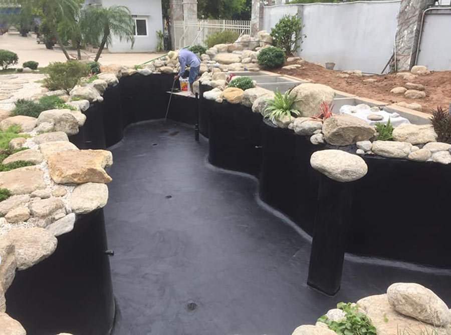 Tham khảo hình ảnh thi công hoàn thiện biệt thự sân vườn có ao cá